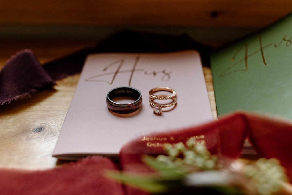 Wedding bands and engagement rings flat lay detail shot