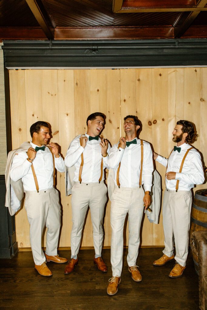 groomsmen photo laughing together