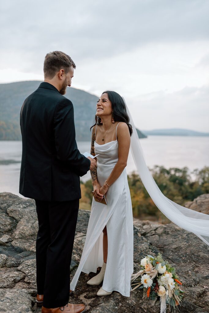 Bride and groom vows on a mountain top in Little Stony Point Park