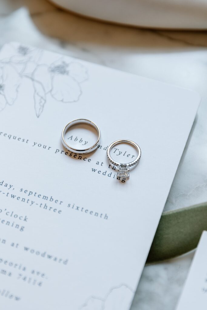 Unique photography ideas with wedding rings on invitation