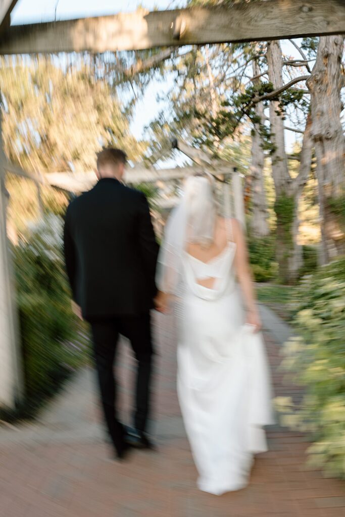 Blurry and in motion bride and groom portrait for The Mansion at Woodward Park wedding