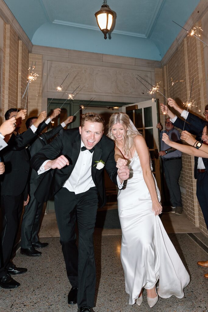 Bride and groom exit from Tulsa Wedding
