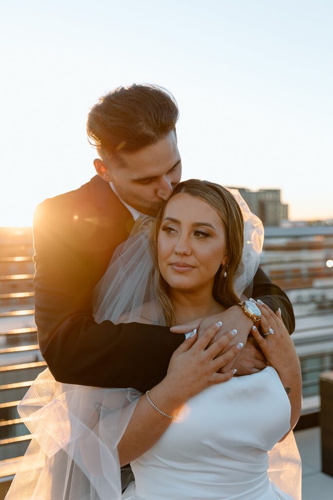 Bride and groom rooftop sunset  portraits for The Vista at 21 wedding
