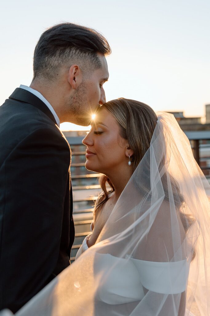 Bride and groom rooftop sunset  portraits for The Vista at 21 wedding