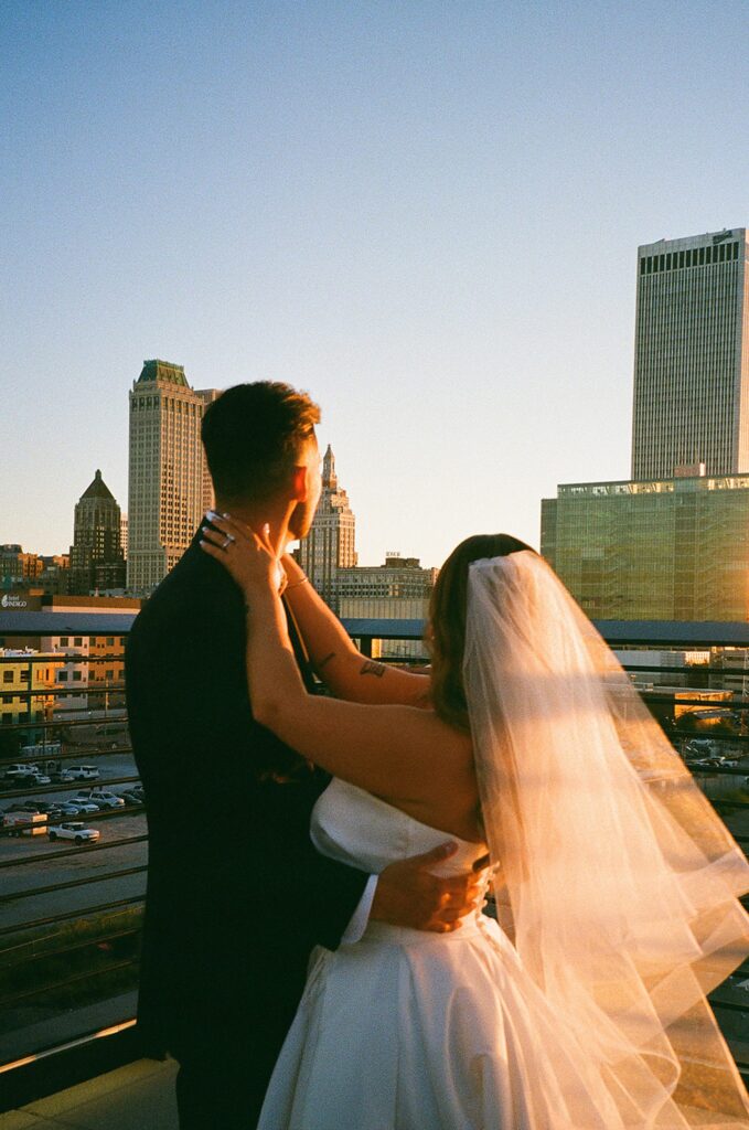 Bride and groom rooftop film portraits for The Vista at 21 wedding
