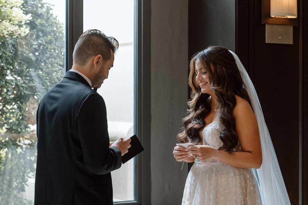 Bride and groom first look before intimate chapel wedding exchanging private vows 