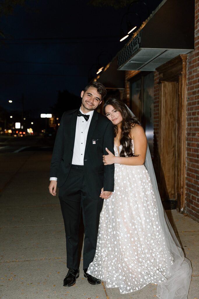 Bride and groom portrait in the city at dark in Long Island 