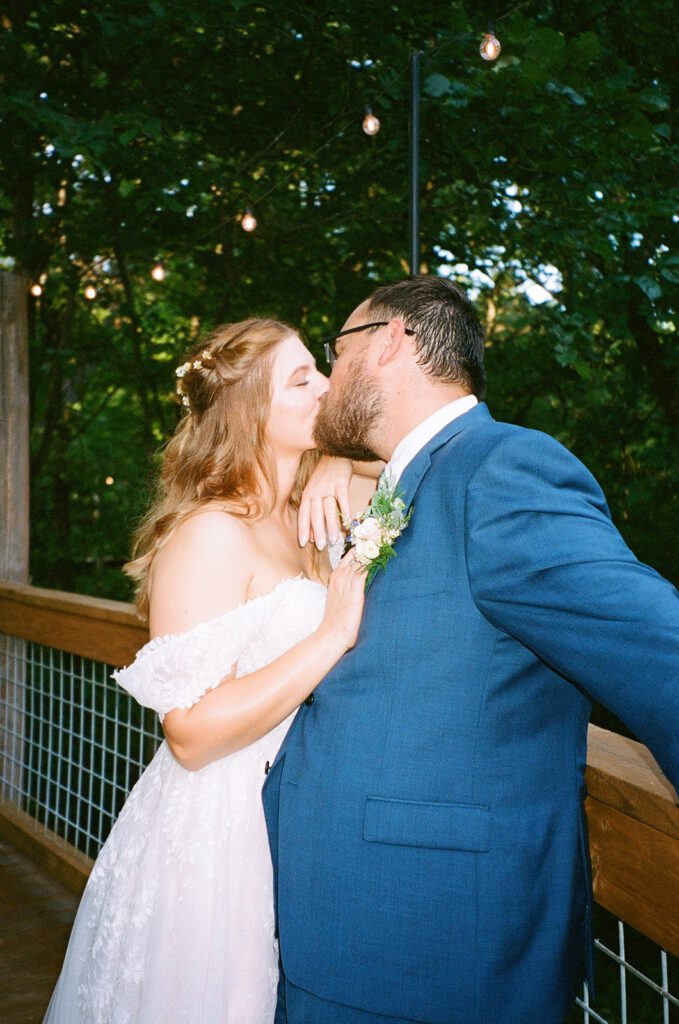 film bride and groom kissing 
