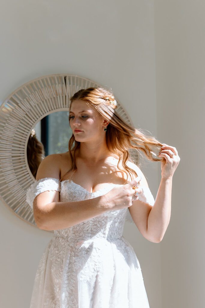 bride putting on perfume