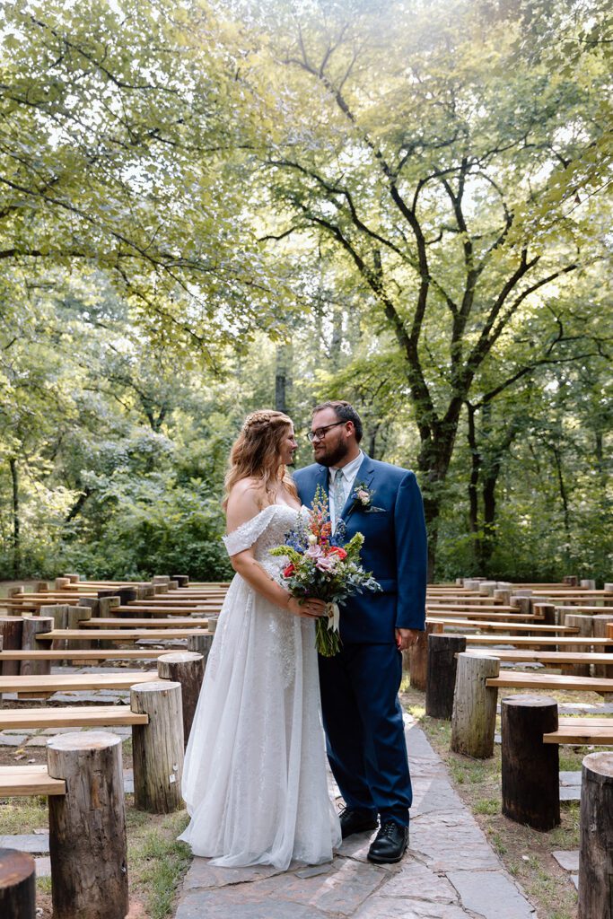 Bride and groom in outdoor ceremony space 