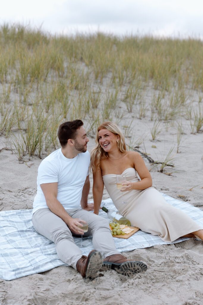 couple on beach having a picnic 