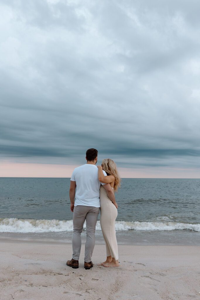 couple at the beach in the sunset 