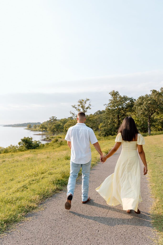 couple walks in Sequoyah state park 