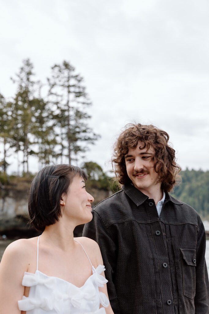 Couple beams at each other at engagement session PNW