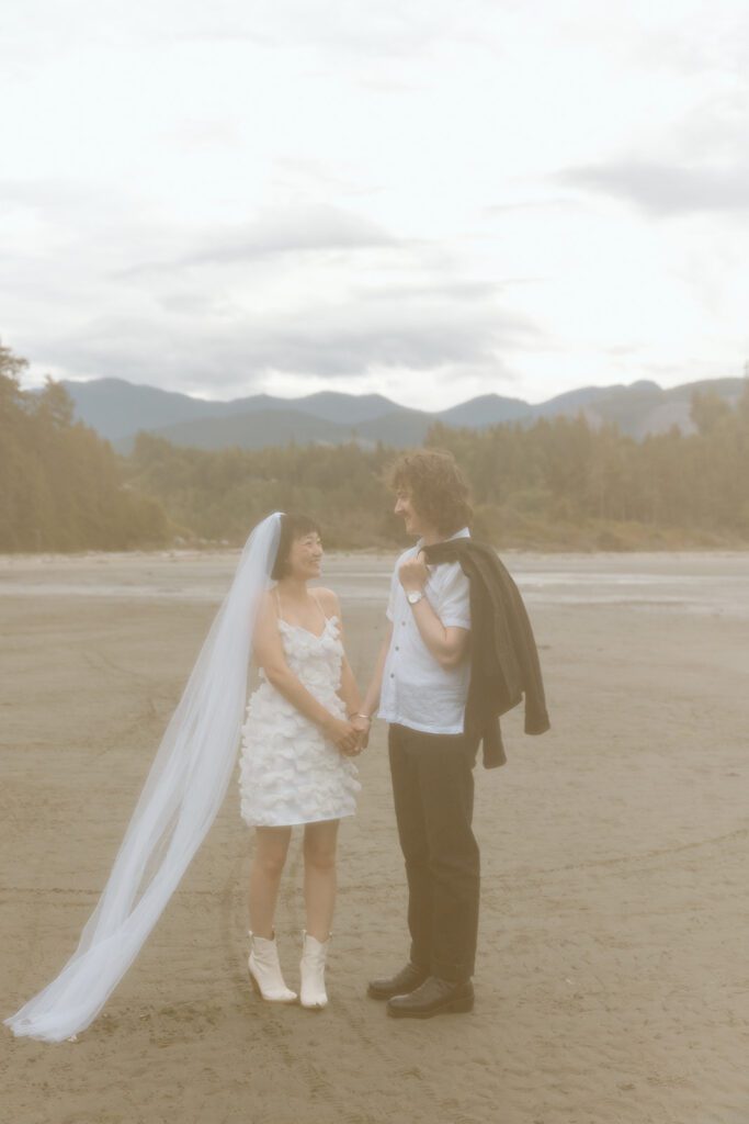 hazy image couple at elopement at olympic national park pnw
