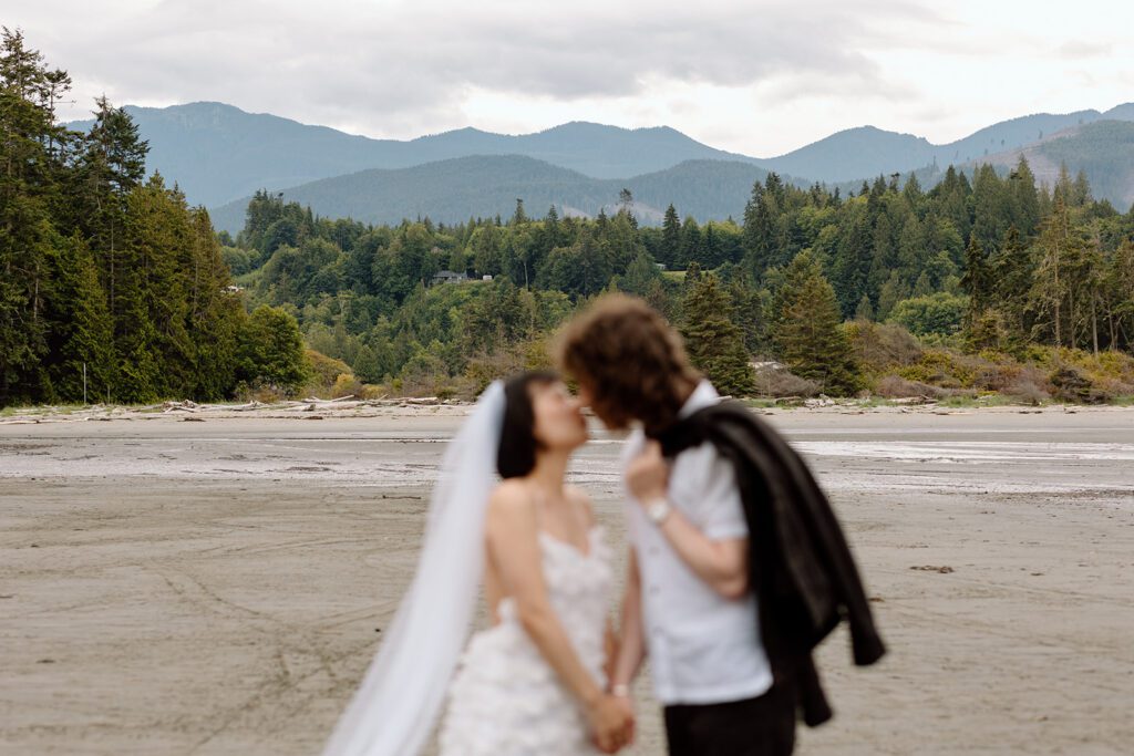 PNW elopement couple with mountain and forest background at olympic state park 