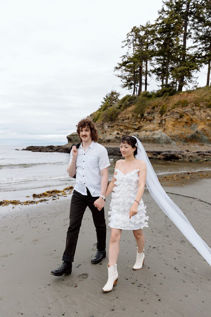 couple at beach for elopement at olympic national park PNW