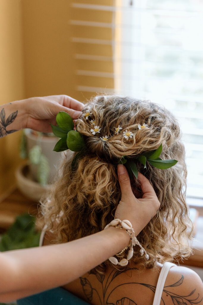 curly haired bridal updo