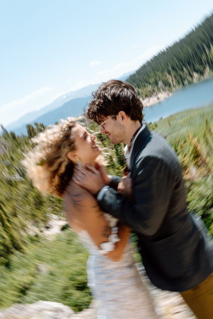 shaken image of bride and groom embrace 