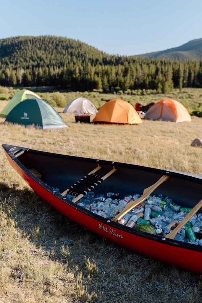 Canoe of drinks at camping elopement in Colorado Guanella's Pass 
