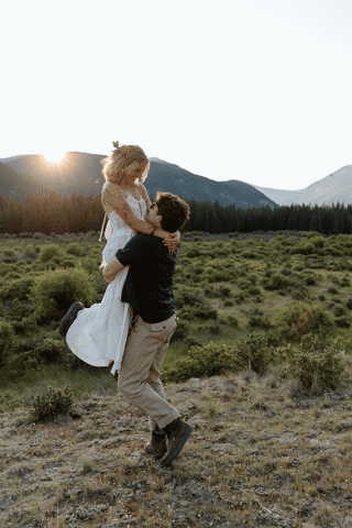 gif of groom spining bride at golden hour in Colorado elopement