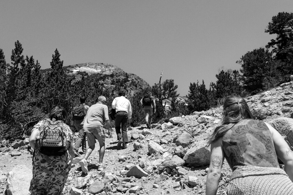 Group hiking up a mountain in Colorado