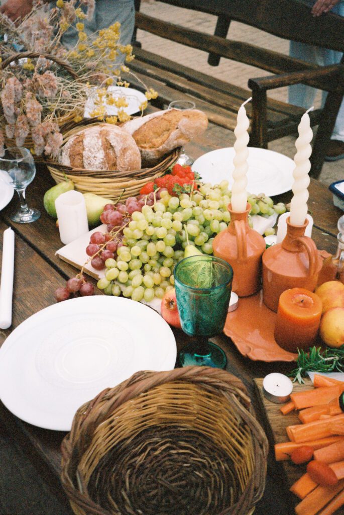table spread with bread and fruit in Greece